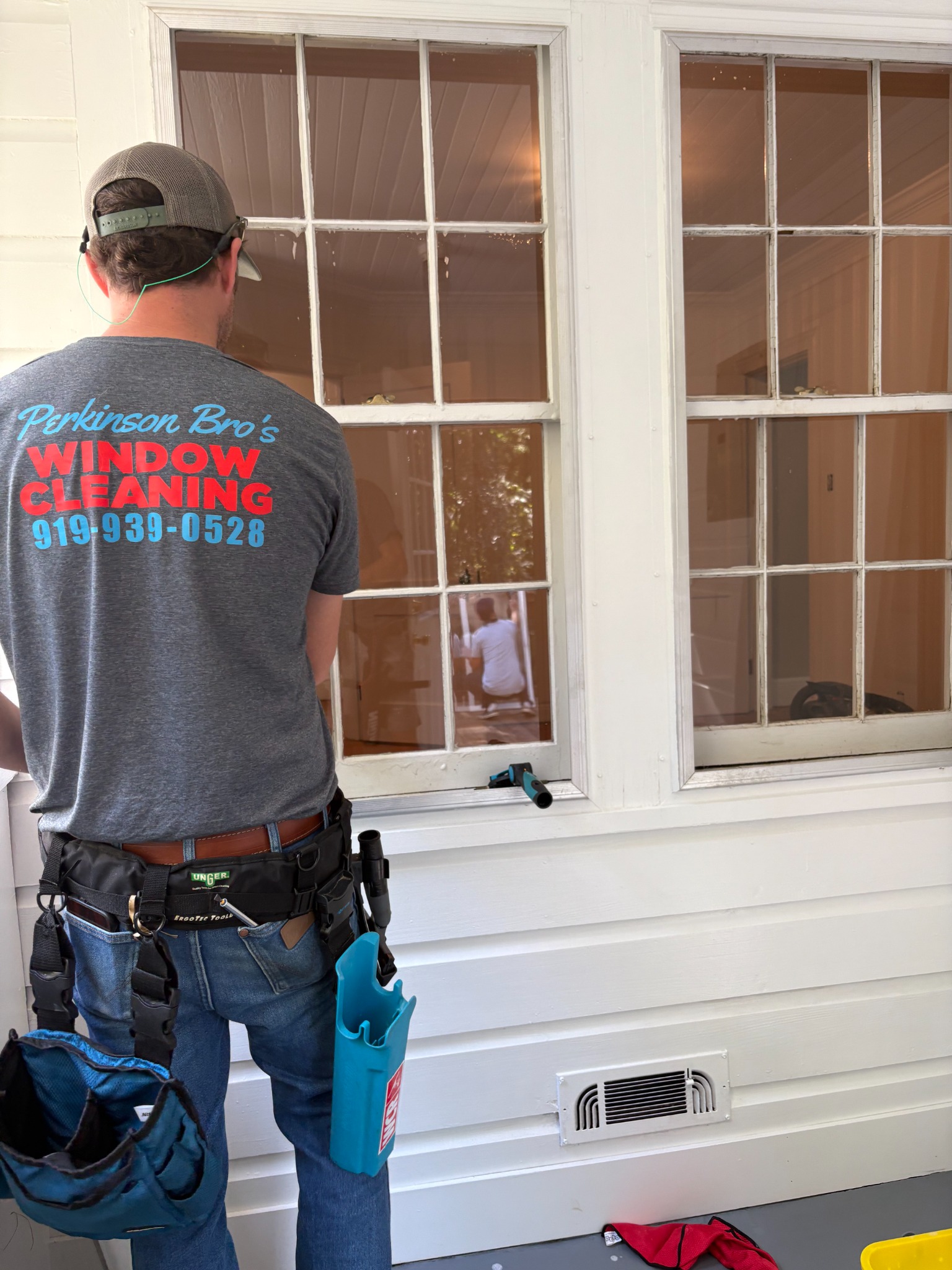 Perkinson Bros cleaning residential windows